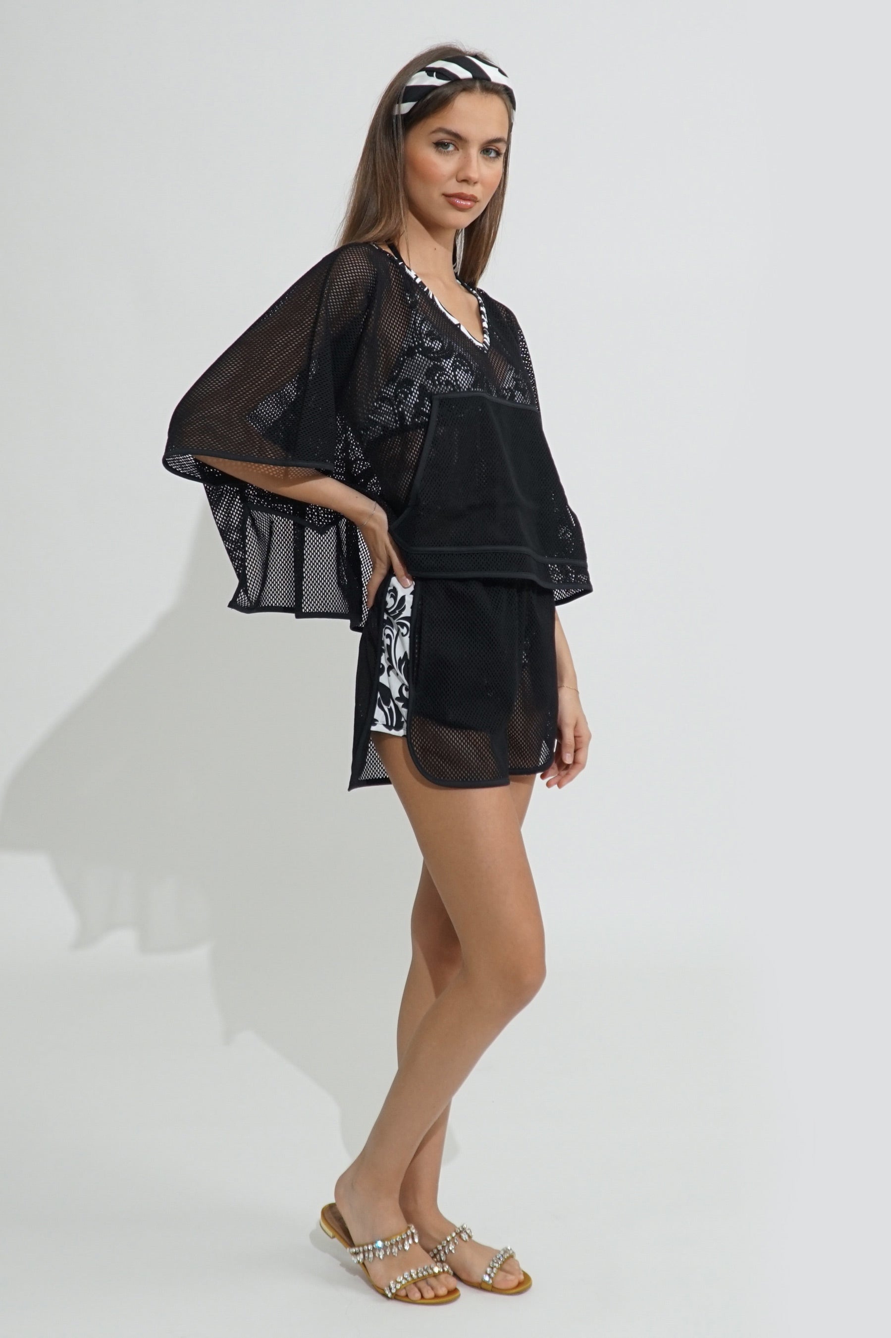 Como perforated lycra Shorts with Pockets in Black-Renaissance print